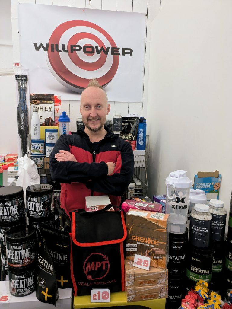 Will Asquith in his Will Power store surrounded by nutrition supplements